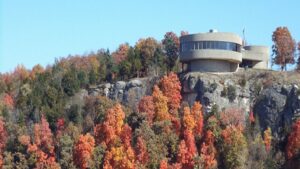 Harry S Truman Visitor Center on Kaysinger Bluff with fall foliage near Warsaw Missouri