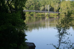 The historic Joe Dice Swinging Bridge spans the Osage Arm near Truman Lake in Warsaw, Missouri.
