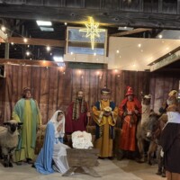 A live nativity scene is part of Cole Camp’s beloved German Christmas celebrations, honoring faith, heritage, and community tradition. Live nativity scene in Cole Camp, Missouri, featuring costumed participants, animals, and a glowing star during the town’s German Christmas events.